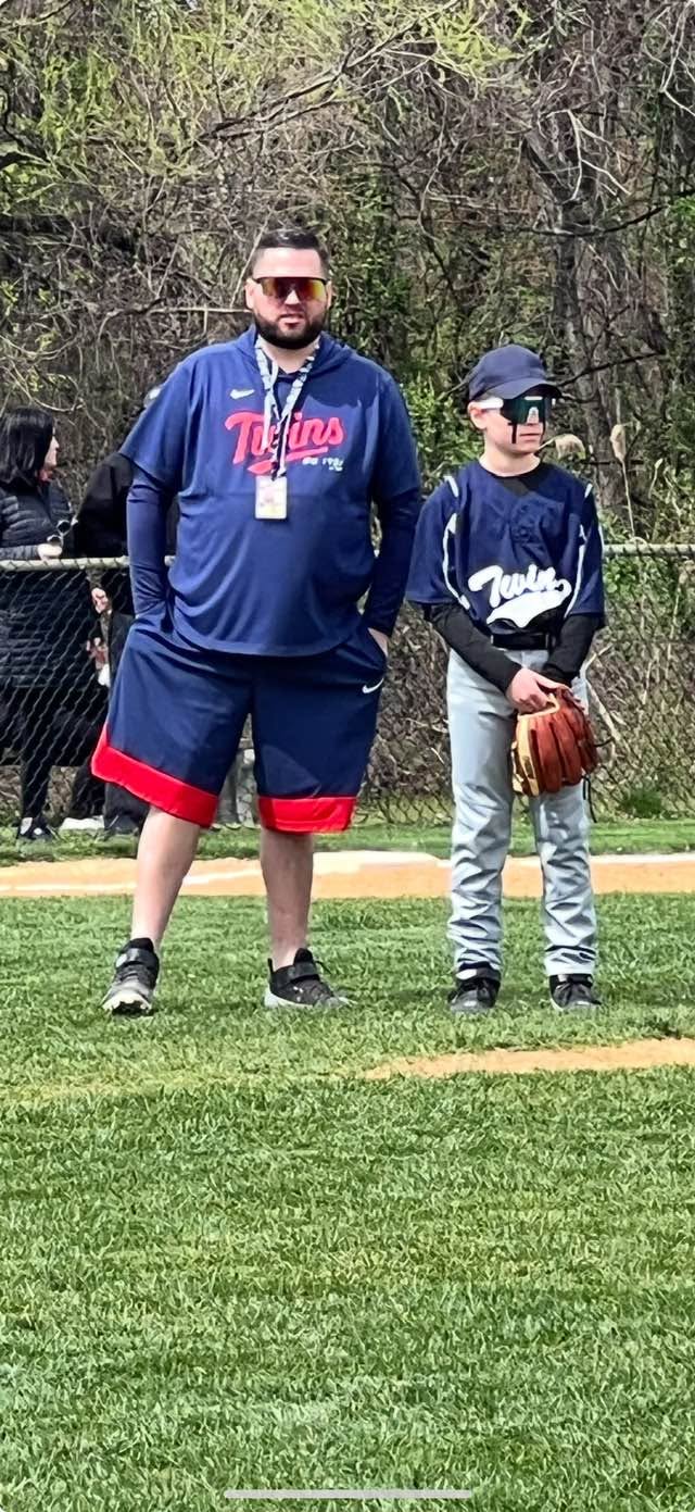 Coach Louis Gelsomini with Chase Yoachum on the baseball field